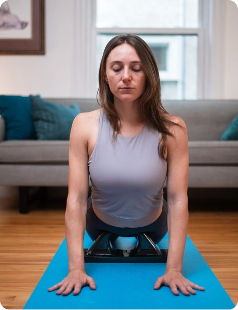 Woman releasing hip flexors